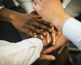 hands reaching together